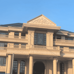 嘉兴黄金麻别墅外墙干挂石材效果示例